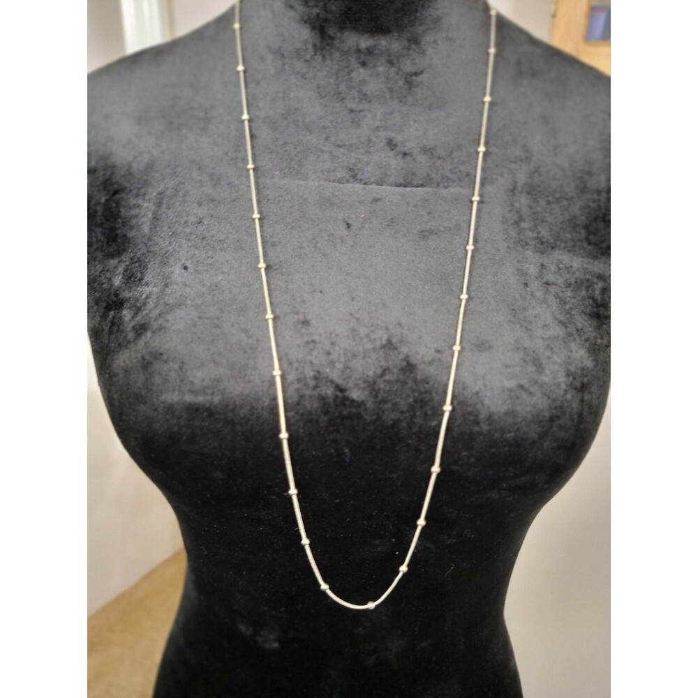 Silver Colored Chain With Evenly Spaced Silver Beads